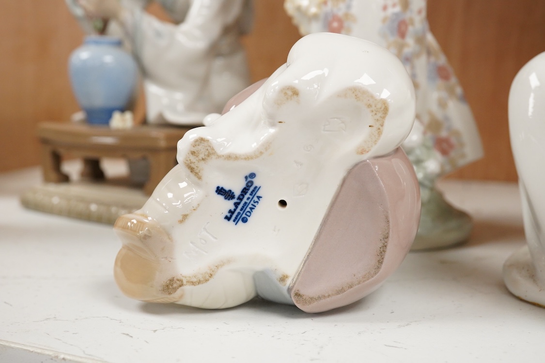 A collection of five Lladro figures, largest 24cm high